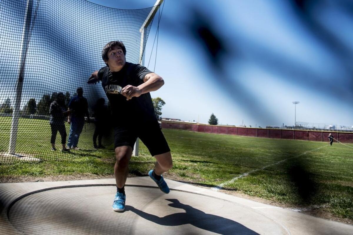 El Capitan's Dominique Navarrette competes in the discus competition during the CCC Center Meet at Golden Valley High School in Merced, Calif., on Wednesday, March 28, 2018.