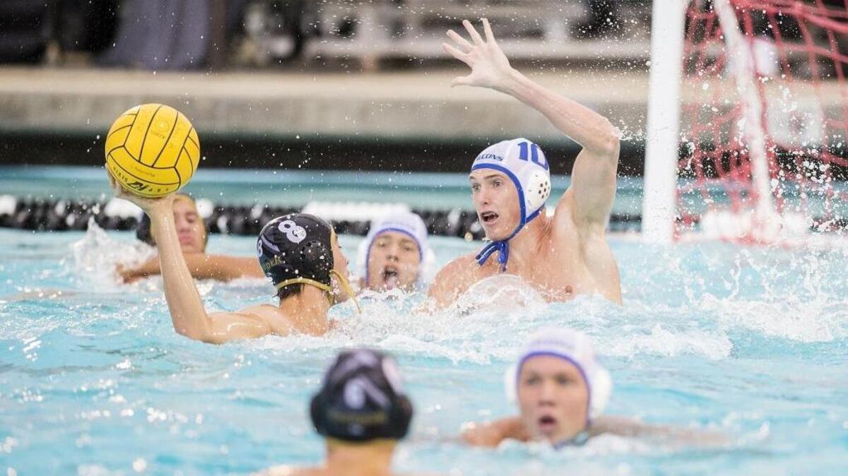 Atwater senior Connor Norton (10) attempts to block the shot of Buhach Colony's Joseph Bustabade (8) during a Sac-Joaquin Section Division II playoff match at Buhach Colony High School in Atwater, Calif., on Friday, Nov. 3, 2017. The Thunder beat the Falcons 10-6.