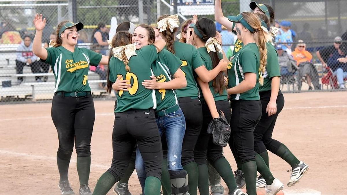 The Mariposa players celebrate their third straight Sac-Joaquin Section Division VI title on Saturday afternoon. Saturday, May 21, 2016 in Stockton.