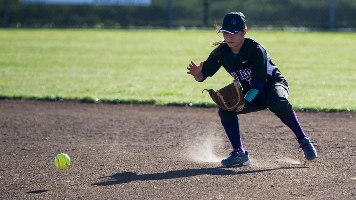 Pacheco senior Jasmine Yruegas (26) fields a ground ball at second base during a game against El Capitan at El Capitan High School in Merced, Calif., Tuesday, March 22, 2016. The Gauchos beat the Panthers 6-3.