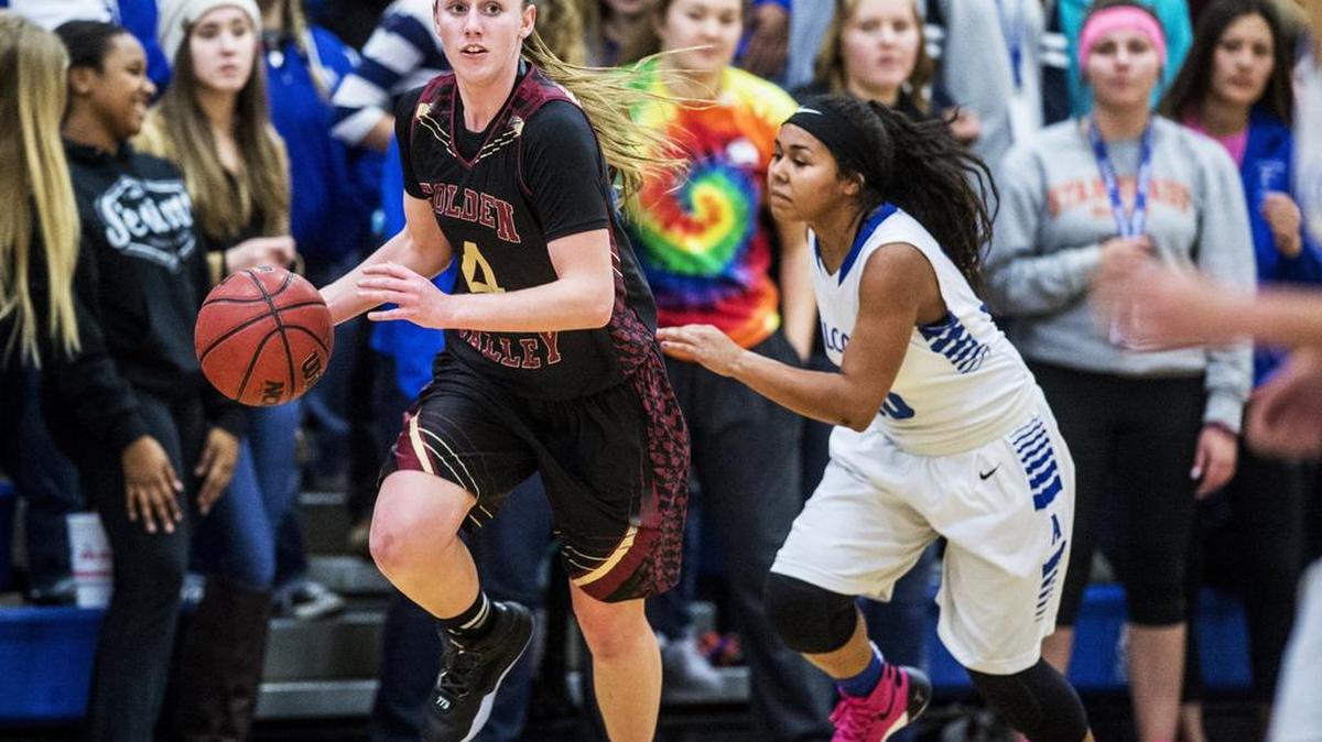 Golden Valley senior Stephanie Moore (4) races up the court during a game against Atwater at Atwater High School in Atwater, Calif., on Thursday, Jan. 14, 2016. The Cougars beat the Falcons 59-43.