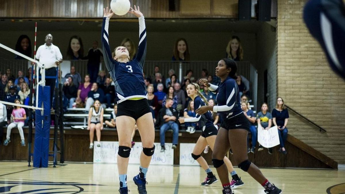 Stone Ridge Christian senior Camryn Murphy (3) sets the ball during a Sac-Joaquin Section Division VI playoff match against Valley Christian at Stone Ridge Christian High School in Merced, Calif., on Thursday, Nov. 2, 2017. The Knights beat the Lions 3-0.