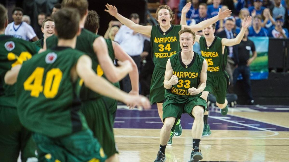 Mariposa senior Lukas Hart (33) runs to his teammates as the Grizzlies celebrate a 79-75 overtime win over the Brookside Knights in the Sac-Joaquin Section Division V Championship game at Sleep Train Arena in Sacramento on Friday, March 4, 2016.