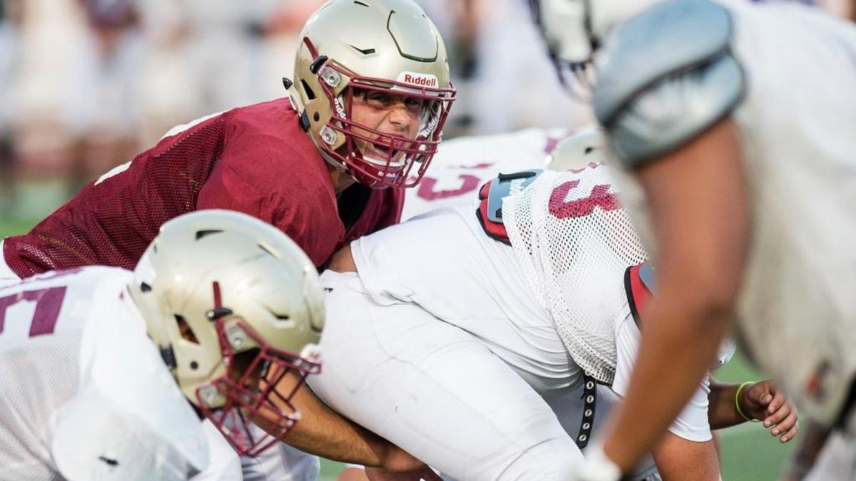 Golden Valley quarterback Jack Solis (2) calls out the play under center during a scrimmage at Golden Valley High School in Merced, Calif., on Saturday, Aug. 19, 2017.