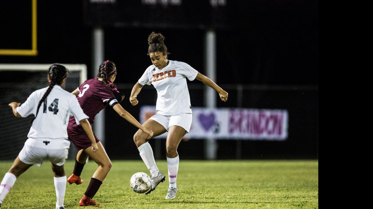 
Merced’s Carris Burges, right, controls the ball during a game against Golden Valley at Merced High School in Merced, Calif., Thursday, April 30, 2015. The game ended in a 2-2 tie.
