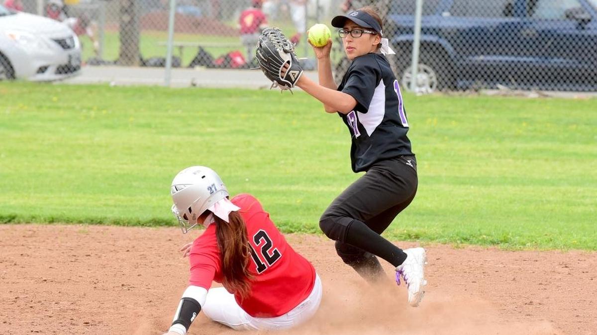 Pacheco second baseman Yosselin Castillo, right, sidesteps the slid of Patterson's Ebony Garza to try and complete a double play. Tuesday April 11, 2017 in Patterson.