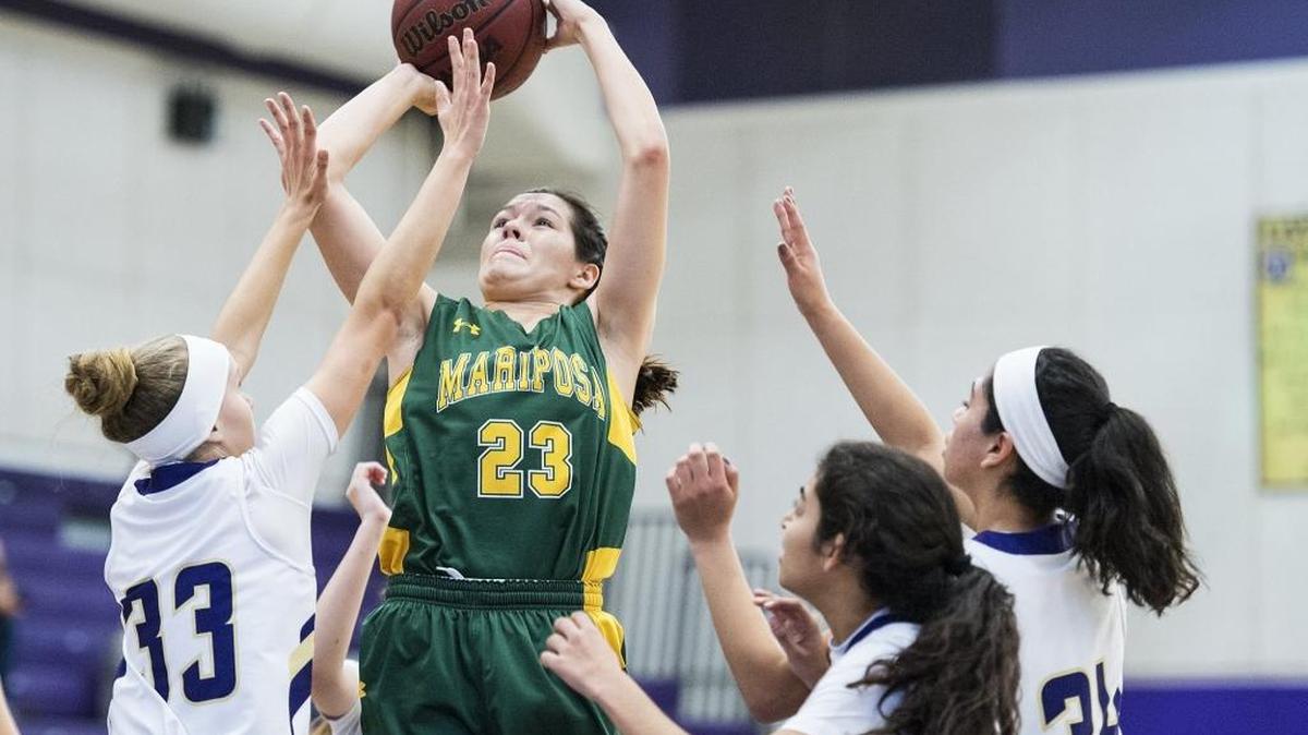 Mariposa junior Milea Appling (23) attempts a jump shot during a game against Livingston at Livingston High School in Livingston, Calif., on Thursday, Dec. 28, 2017. The Grizzlies beat the Wolves 57-45.