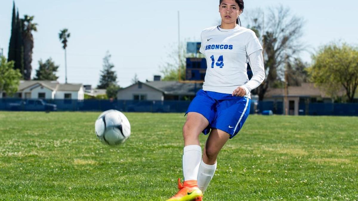 Dos Palos High School's Sabrina Cabrera shoots the ball on net during a portrait at Dos Palos High School in Dos Palos, Calif., on Friday, March 31, 2017. Cabrera is the Merced Sun-Star Girls Soccer Player of the Year.