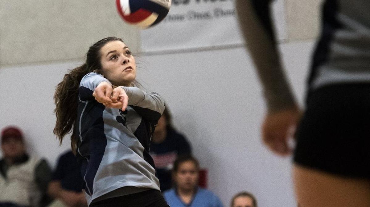 Stone Ridge Christian's Morgan McCary returns a serve during the Central California Athletic Association match with Turlock Christian in Turlock, Calif., on Tuesday, October, 27, 2015. Turlock Christian won the match 3-1.