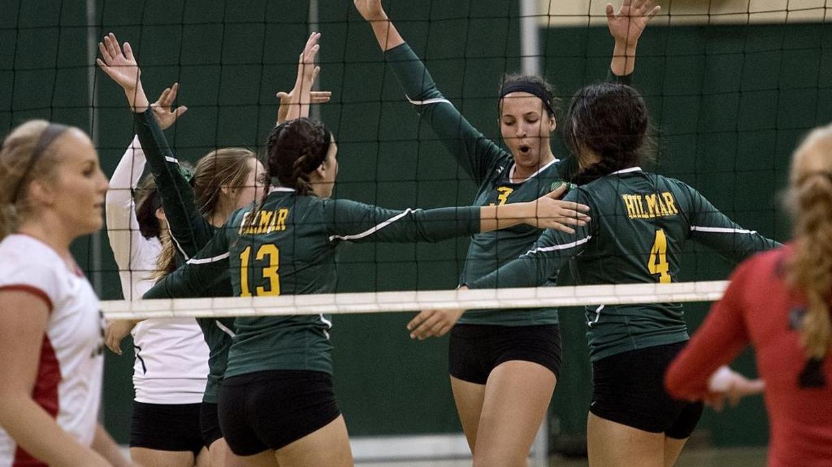 
Hilmar teammates celebrate a point during the Trans Valley League match with Ripon at Hilmar High School on Wednesday, Sept., 30. 
