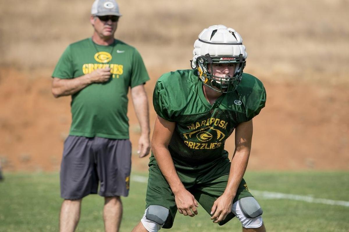 Mariposa’s J.C. Davis prepares to run a drill during football practice at Mariposa High School in Mariposa, Calif., on Tuesday, Aug. 7, 2018.
