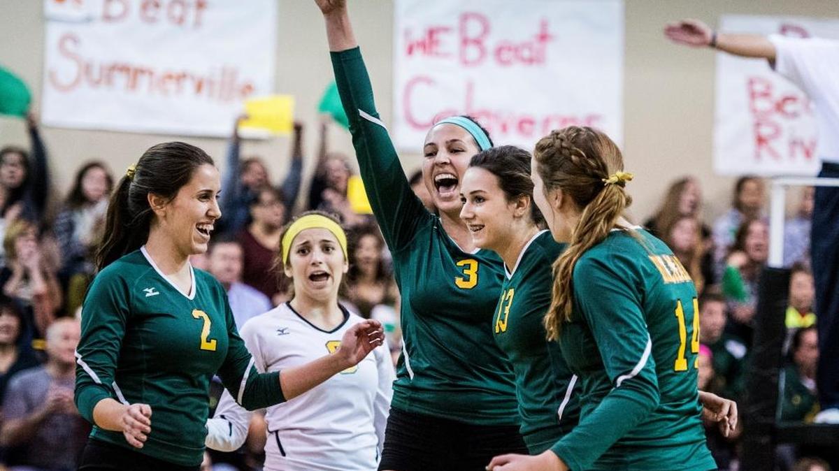 Hilmar High volleyball players celebrate a point during the Sac-Joaquin Section Division IV semifinal match against Bear River on Tuesday. The Yellowjackets will play Sonora in the Sac-Joaquin Section Division IV title game Saturday.