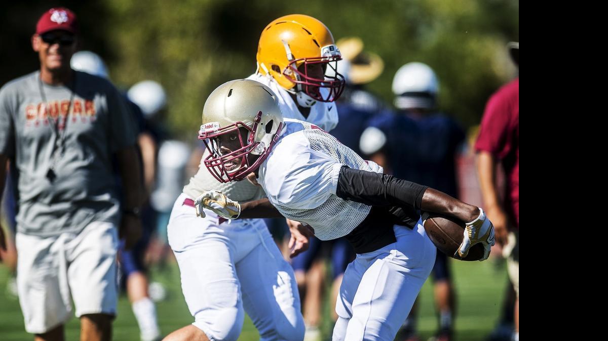 
Golden Valley receiver Cadrian McDaniel catches a pass near the sideline during the Golden Valley football camp on Wednesday. 
