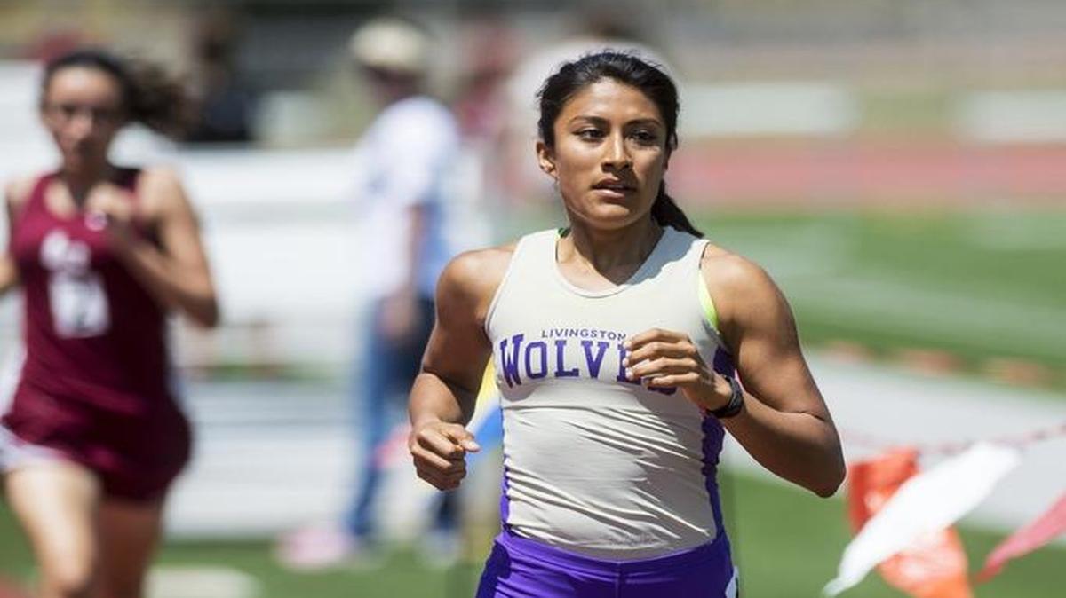Livingston senior Daisy Perez leads the field during the girls 1600 meter race during the Western Athletic Conference Championship at Golden Valley High School in Merced, Calif., Thursday, May 12, 2016.