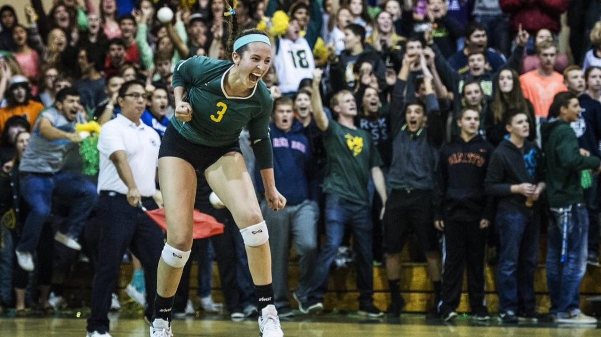Hilmar senior Emily Baptista (3) jumps into the air as the Yellowjackets are awarded match point during the Sac-Joaquin Section Division IV semifinal game against Bear River at Hilmar High School in Hilmar, Calif., Tuesday, Nov. 17, 2015. The Yellowjackets beat the Bruins 3-0.