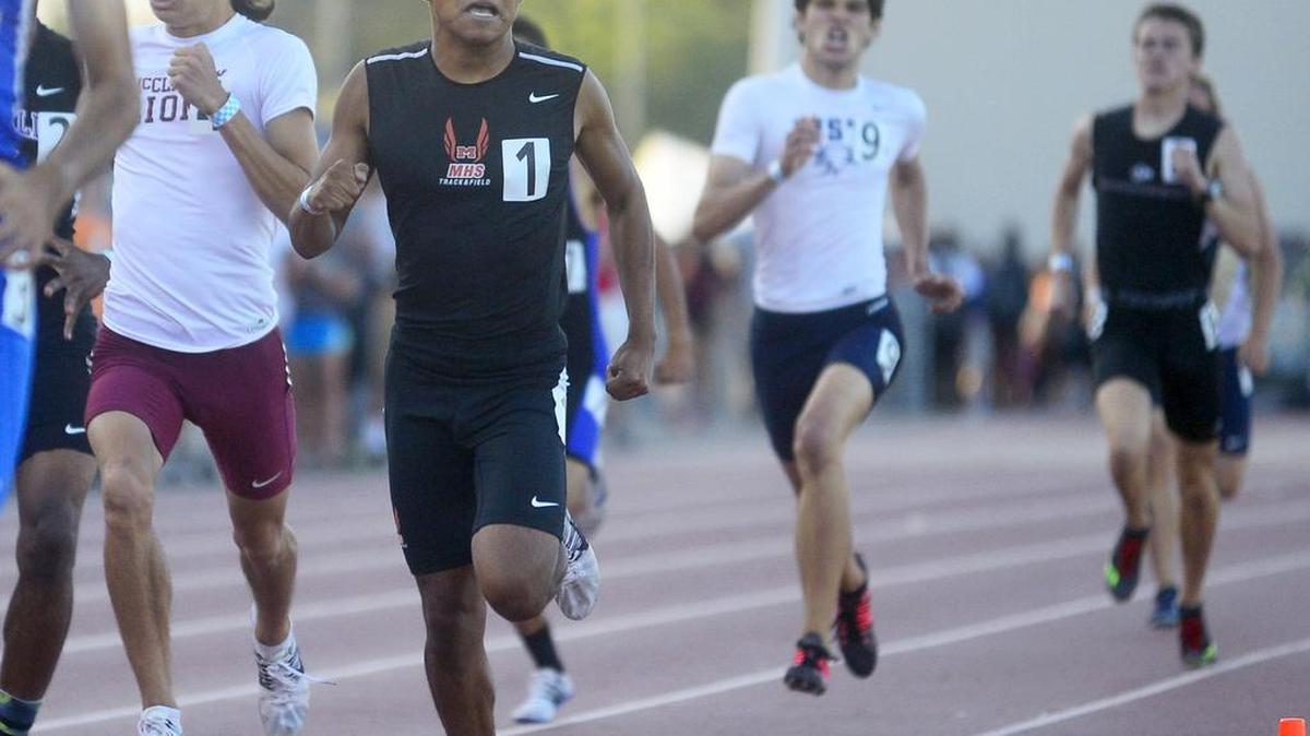 Merced High’s Daniel Ambriz runs in the Boys 800 Meter Race during the Sac-Joaquin Section Track and Field Masters Championship at Elk Grove High School in Elk Grove California on May 27, 2016.