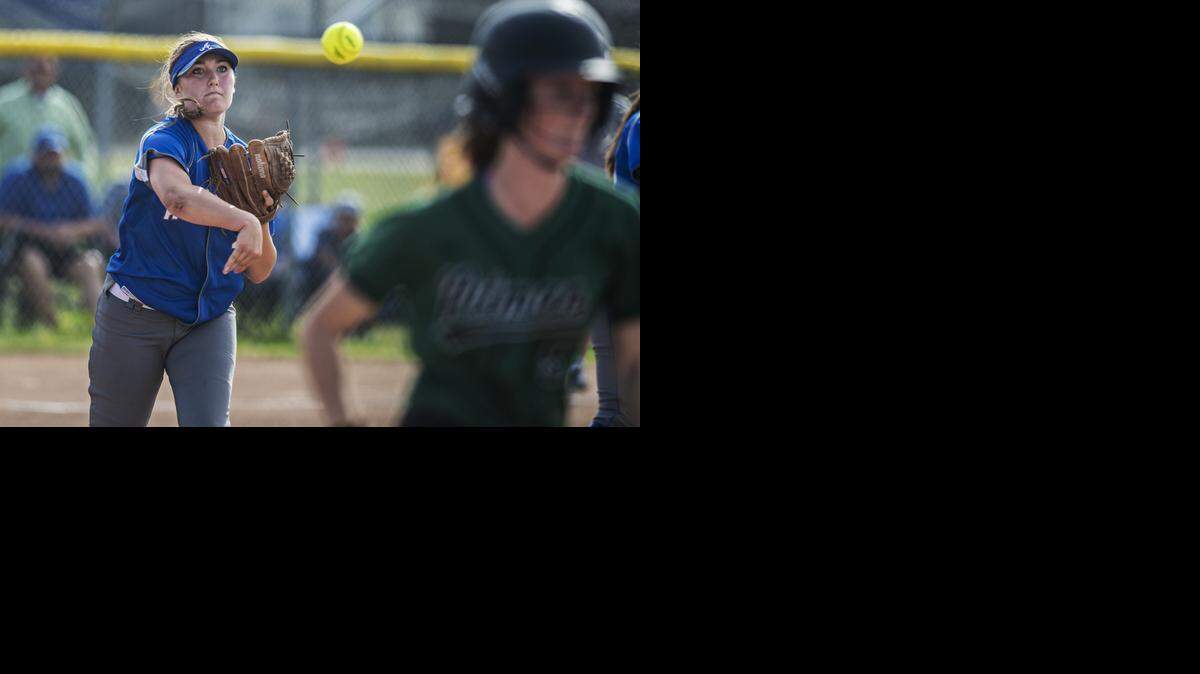 
Atwater sophomore Cheyenne Mahy (23) throws to first base for an out after fielding a bunt from the pitcher's mound during a game against Pitman at Atwater High School in Atwater, Calif., Friday, March 20, 2015. The Falcons beat the Pride 1-0.
