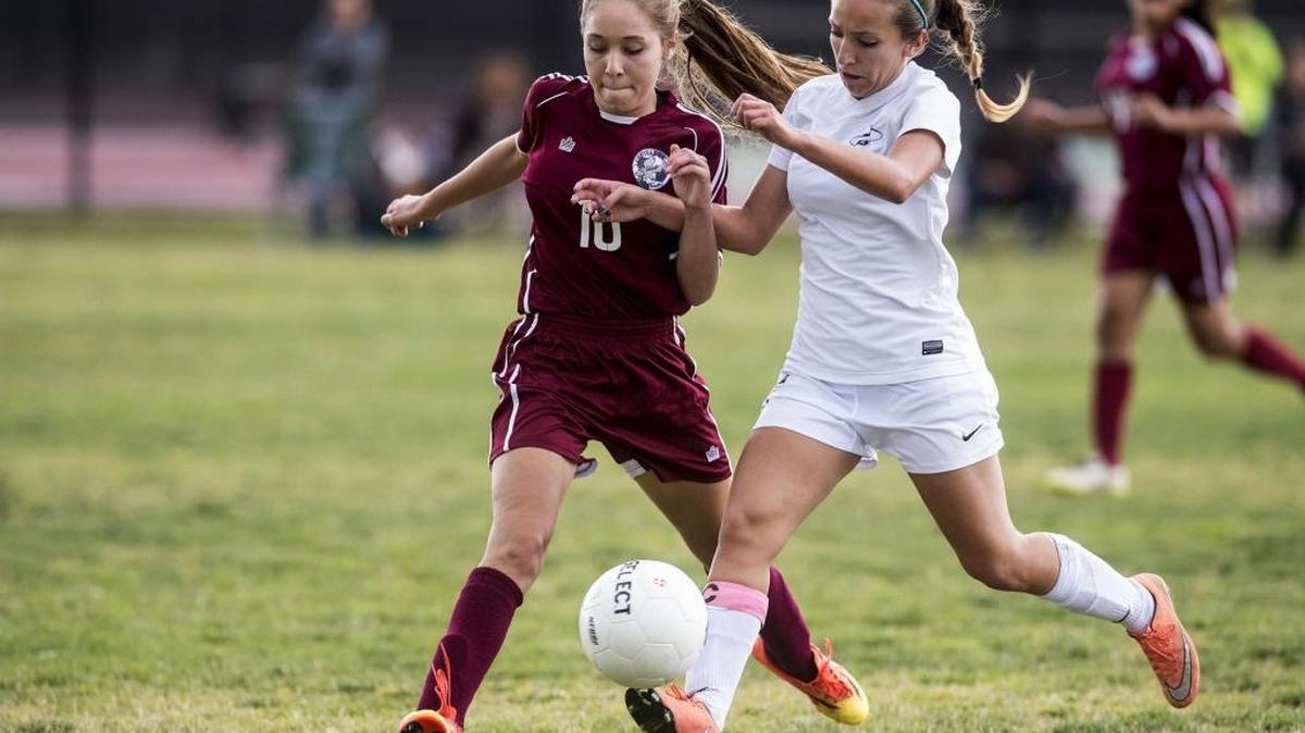 El Capitan junior Kristiana Montiel (5) battles for possession of the ball with Central Valley junior Blanca Espinoza (10) during a game at El Capitan High School in Merced, Calif., Wednesday, April 27, 2016. The Hawks beat the Gauchos 2-0.