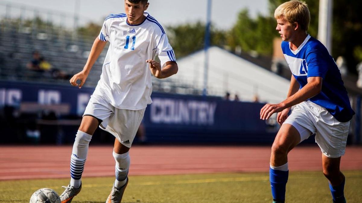 Atwater senior Omar Duran (11) controls the ball during a game against Turlock at Atwater High Schoolon Sept. 15. The Falcons beat the Bulldogs 6-0.