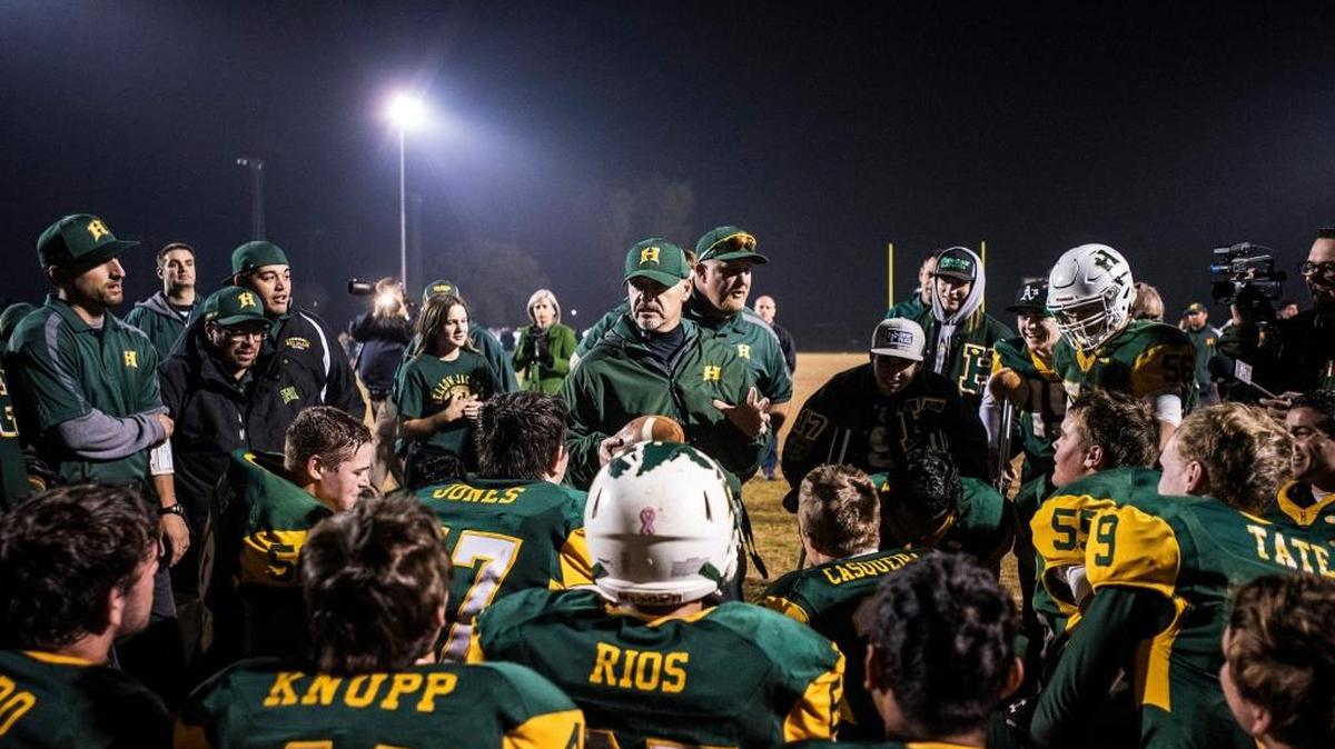 Hilmar coaches address the Yellowjackets after their 34-28 win over visiting Ripon Christian last Saturday in the Division VI semifinals. Hilmar won the Division IV title in 2011.