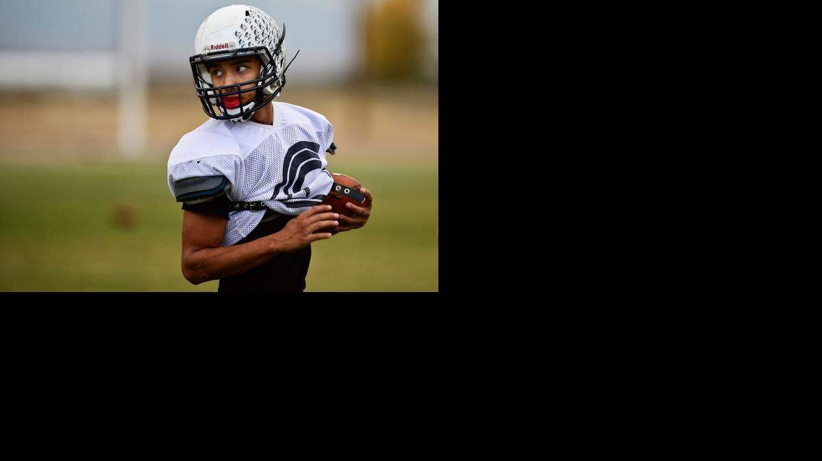 
Stone Ridge Christian senior Bailey Dahlhoff (28) sprints up the field during football practice in Merced, Calif., Wednesday, Nov. 19, 2014.
