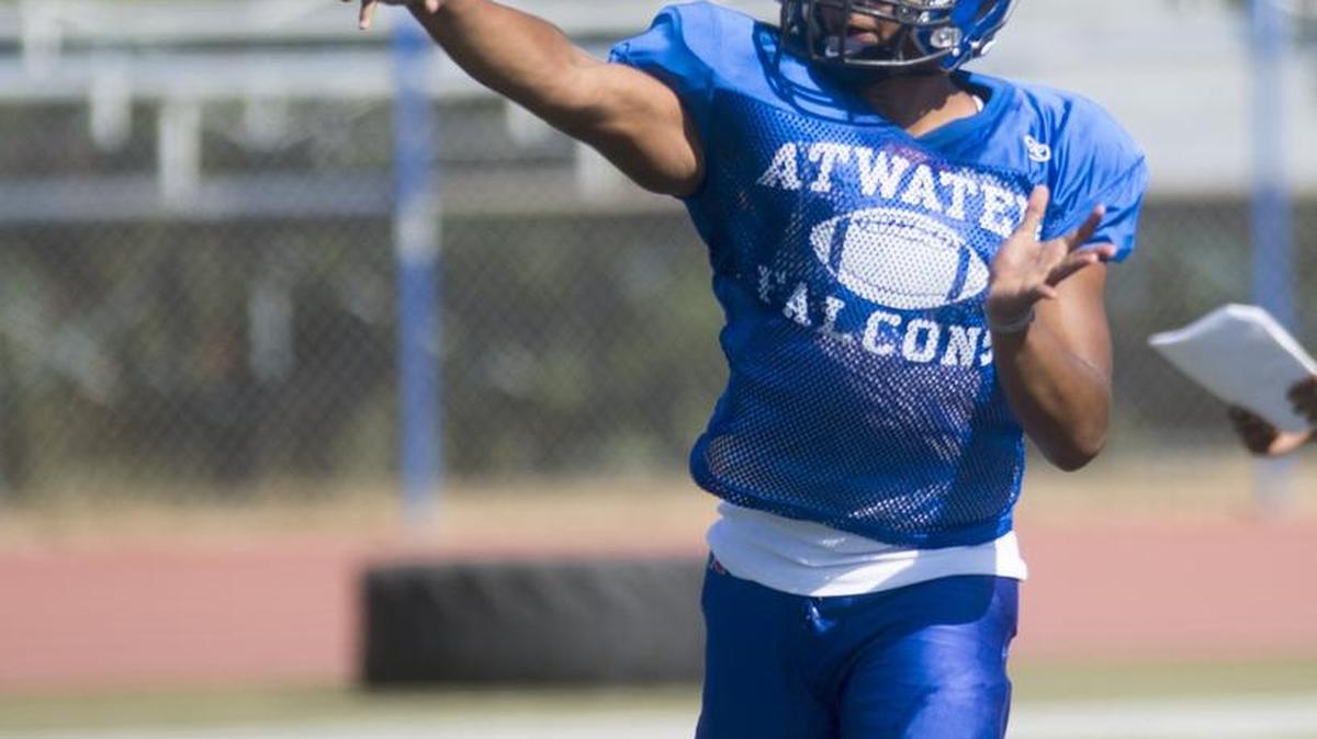 
Atwater High quarterback Frank Cocio throws a pass during practice in Atwater on Wednesday. The Falcons host Livingston in a scrimmage on Saturday at Falcon Field.

