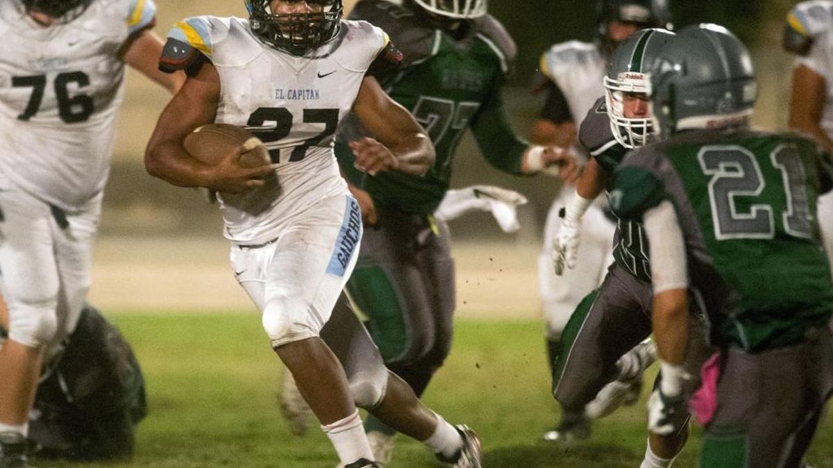 El Capitan running back Joshua Stewart cuts upfield during a game between El Capitan High School and Central Valley High School at Ceres High on Oct. 23, 2015.