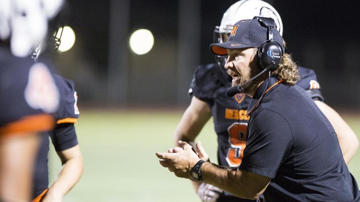 Merced head coach Rob Scheidt speaks to his players during a game against Pitman at Veterans Stadium in Merced on Sept. 23, 2016. Merced is hoping to win a fourth consecutive Central California Conference championship. After opening CCC play with a loss to Pitman, the Bears likely have to win this week and need the Pride to suffer a loss to have a shot at its goal. Merced also sits two wins shy of the six wins it will need to reach the Sac-Joaquin Section playoffs.