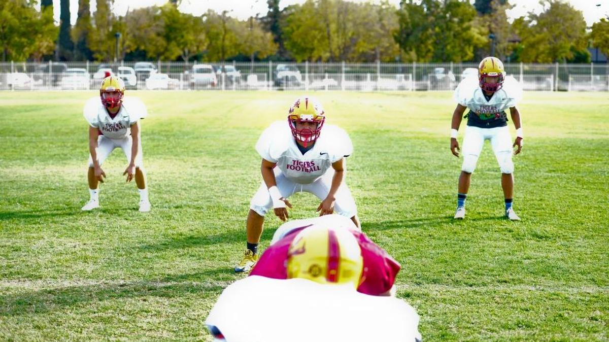 
From left, Los Banos’ Adam Herrera, Daniel Fernandez and David Walker have had almost as much impact on the defensive side of the ball as they have on offense. 
