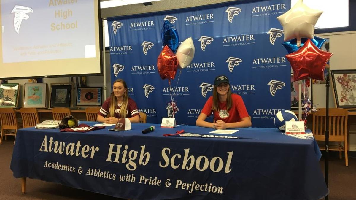Atwater’s Cheyenne Mahy, left, and Abby Knapp signed letters of intent at Atwater High on Monday morning. Mahy will play softball at Texas Woman’s University and Knapp will play volleyball at Gonzaga University.