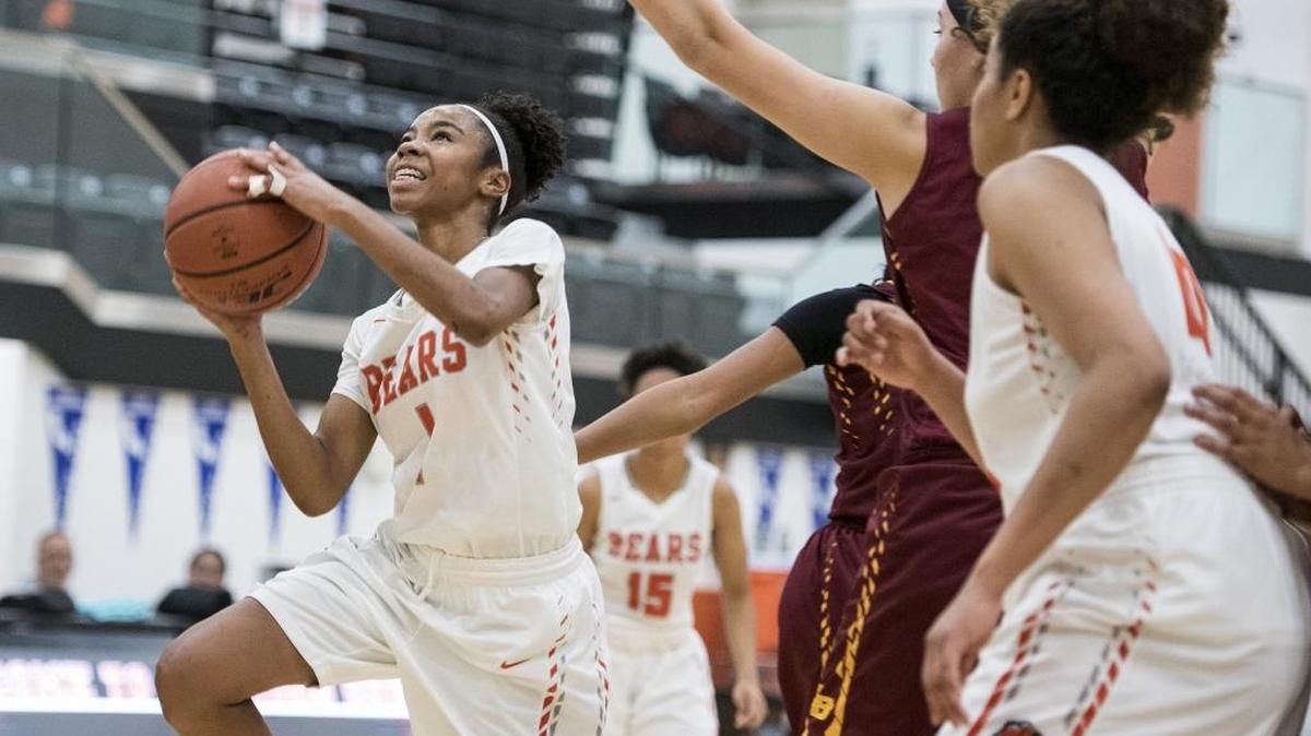 Merced junior Amaya Ervin (1) attempts a layup during a game against Los Banos at Merced High School in Merced, Calif., on Tuesday, Dec. 5, 2017. The Bears beat the Tigers 58-33.