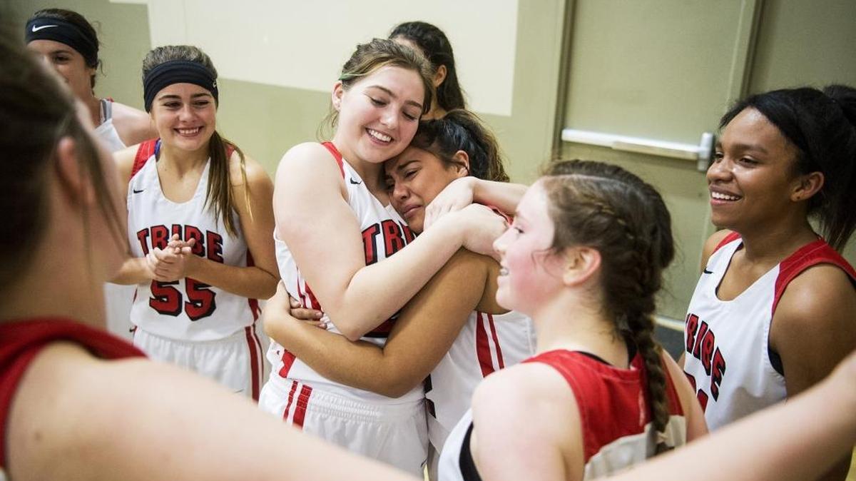 The Chowchilla Tribe celebrate a 48-29 win over Rosamond in a CIF Central Section Division V playoff game at Chowchilla High School in Chowchilla, Calif., on Wednesday, Feb. 28, 2018.