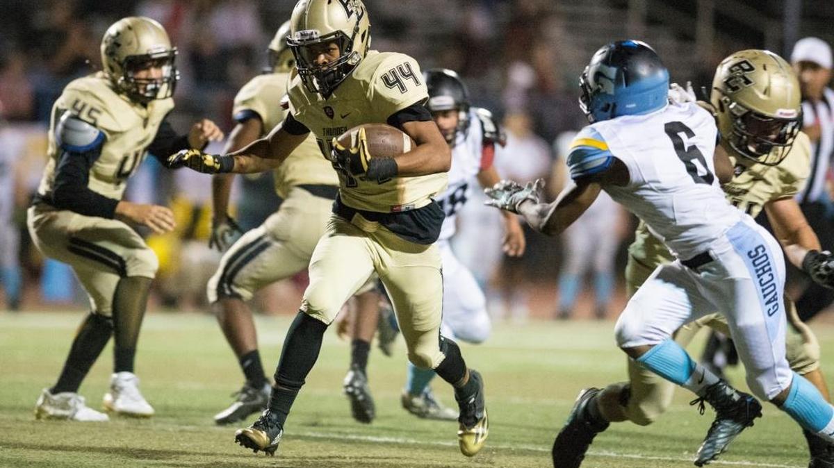 Buhach Colony running back Irik Dobbins (44) rushes during a game against El Capitan at Atwater High School in Atwater, Calif., Friday, Oct. 7, 2016. The Thunder open the 2017 season at home on Friday against Downey.