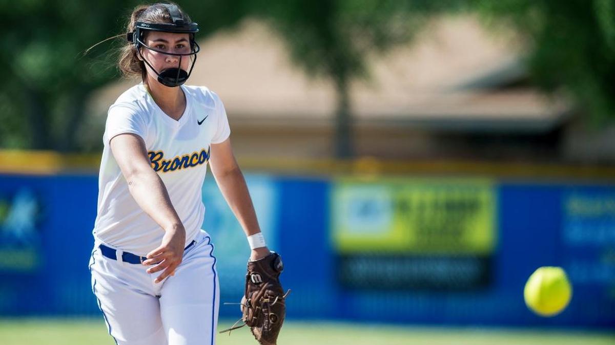 Dos Palos sophomore pitcher Janessa Jasso (10) throws during a game against Coalinga at Dos Palos High School in Dos Palos, Calif., on Friday, April 28, 2017.