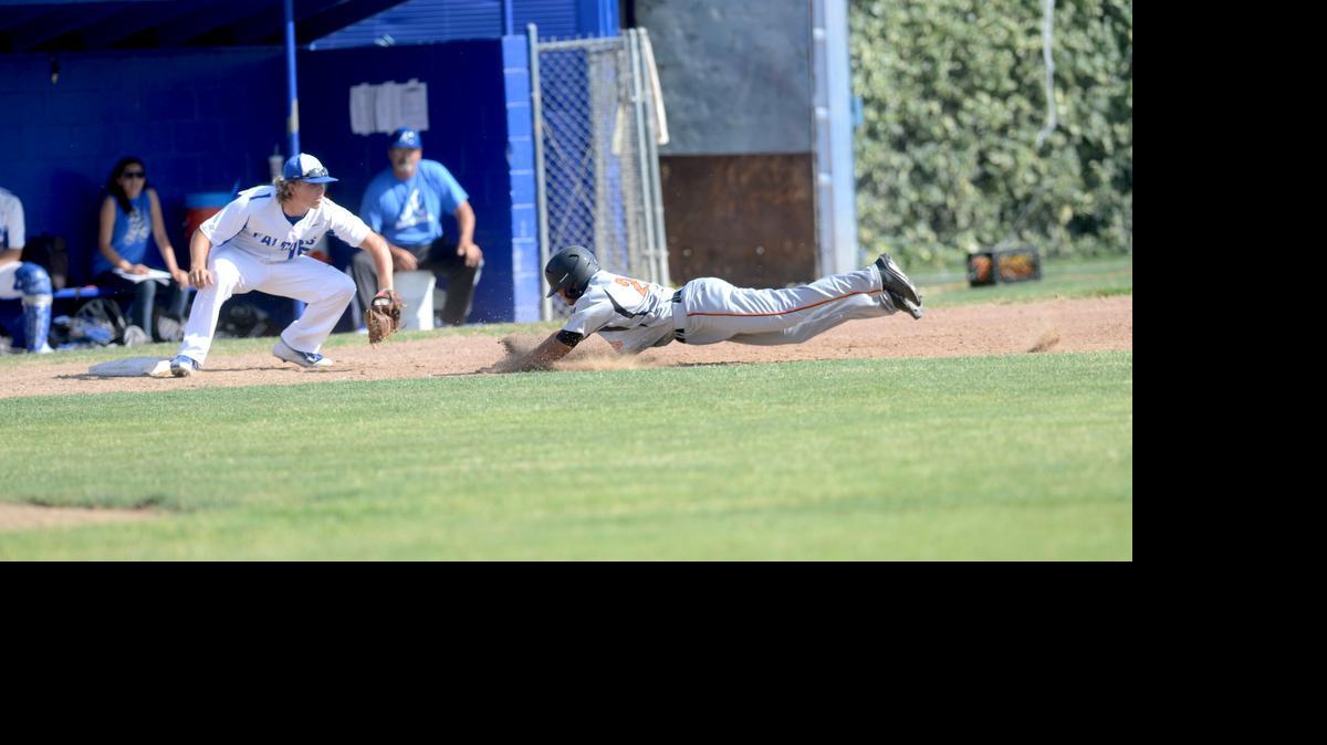 
Atwater third baseman Wyatt Pimentel, left, waits to apply the tag on Merced's Ulonzo Gilliam as he tried to stretch a hit into a triple. Gilliam was out, but drove in a run on the play.
