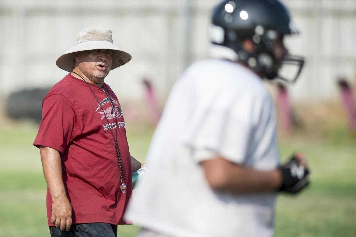 Head coach Rod McCombs looks on during football practice at Delhi High School in Delhi, Calif., on Thursday, Aug. 9, 2018.