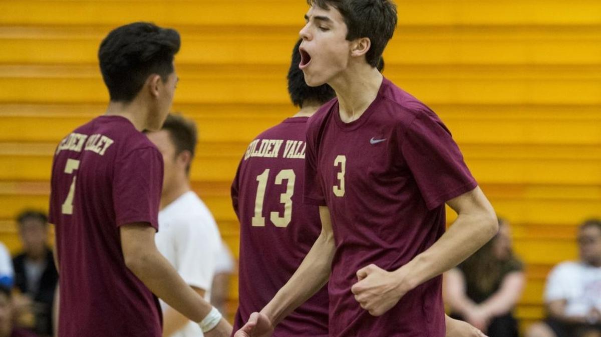 Golden Valley sophomore Bryan Livesay (3) celebrates a Cougar point with teammates during a volleyball match against Merced earlier this season. Livesay was named the Central California Conference Offensive Player of the Year.