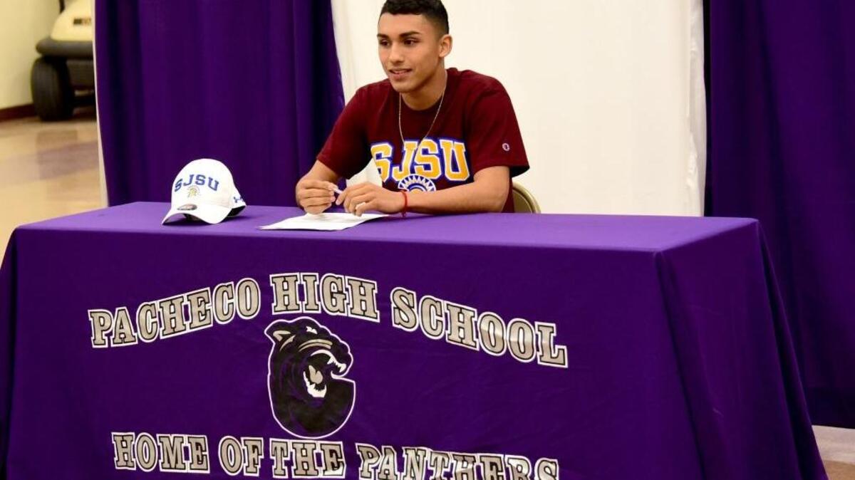 Pacheco soccer star Brian Nevarez speaks to the crowd of coaches, teammates, family and friends that gathered in the Pacheco High cafeteria on Monday night to watch Nevarez sign his letter of intent to play for San Jose State next year. Monday, Feb. 6, 2106 in Los Banos.
