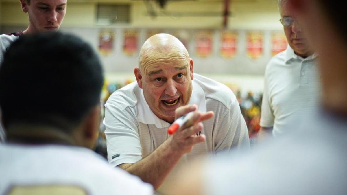 Golden Valley head coach Keith Hunter speaks to his team during a game against Merced last season. Friday’s win over Enterprise brought Hunter’s career win total to 400.