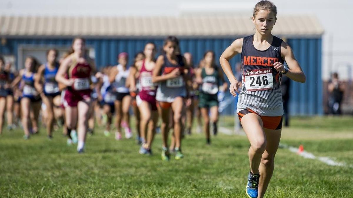 Merced's Quinn Hagerman leads the pack into the second turn during the CCC Cross Country Center Meet at Atwater High School in Atwater, Calif., on Wednesday, Oct. 4, 2017.