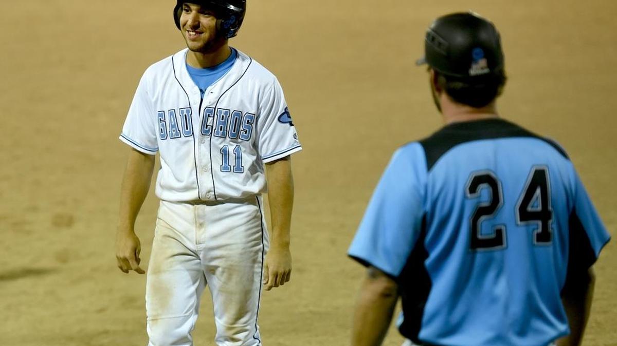 El Capitan's Tyler Skelton smiles at the dugout after a RBI single. Skelton drove in the Gauchos' final run in a 7-1 victory over Placer. Wednesday, May 18, 2016 in Lodi.