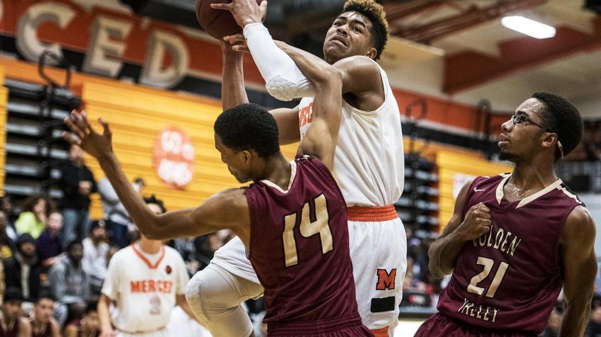 Merced senior Alexander Ray Stewart (10) attempts a layup during a game against Golden Valley at Merced High School in Merced, Calif., Friday, Jan. 22, 2016. The Bears beat the Cougars 46-40.