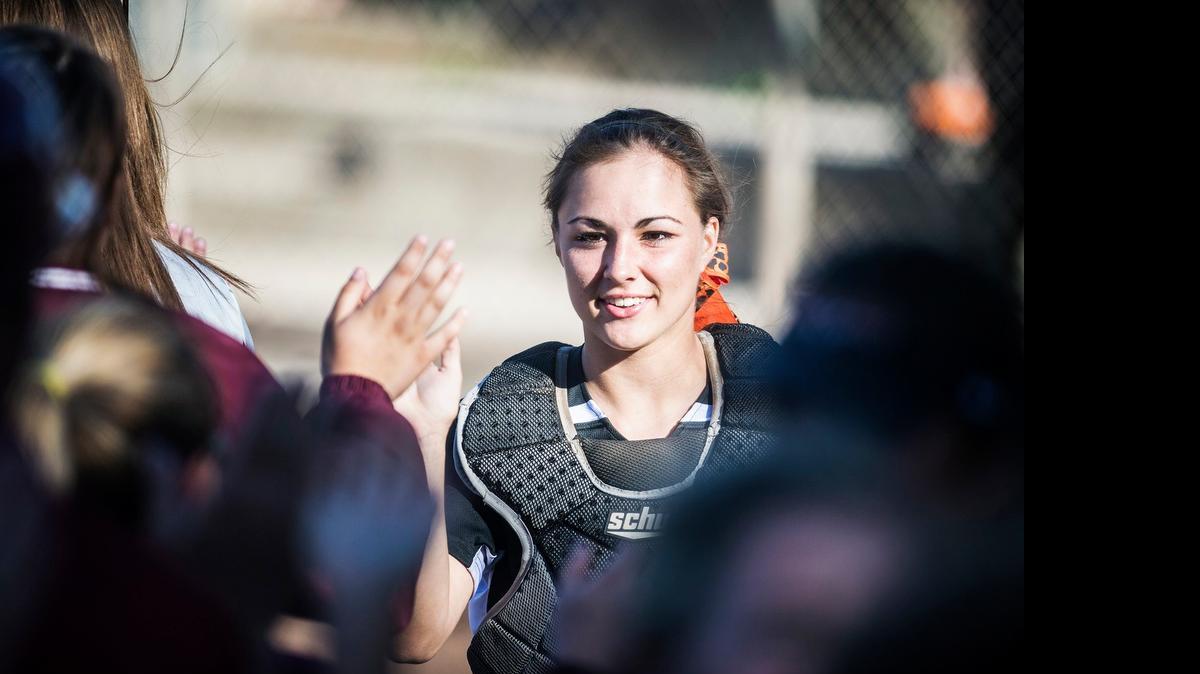 
Merced senior Megan Kravec shakes hands with Golden Valley players after a 10-0 Bears victory over the Cougars in March. 

