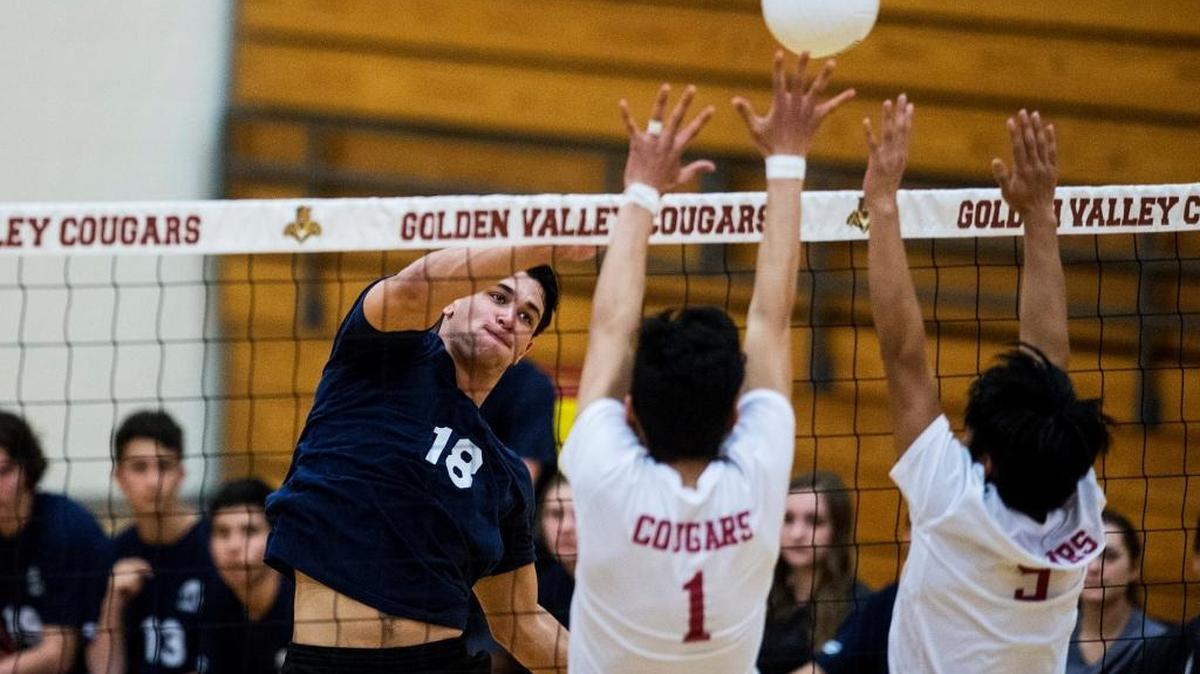 Stone Ridge Christian senior Jonathan Collazo (18) spikes the ball during a match against Golden Valley at Golden Valley High School in Merced, Calif., on Tuesday, April 11, 2017. The Knights host Los Banos in the first round of the Sac-Joaquin Section Division III playoffs on Tuesday night at 7.