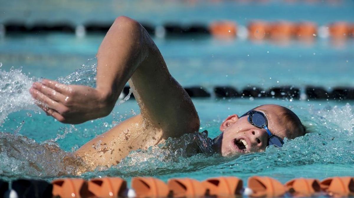 Merced junior Hayden Giebeler competes during a swim meet against Golden Valley at Merced High School in Merced, Calif., on Thursday, April 13, 2017.
