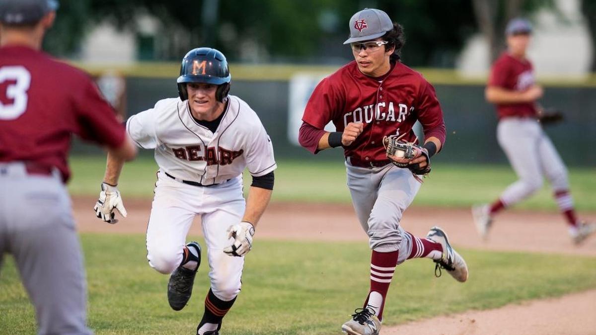 Golden Valley senior Jiovany Landeros (2) runs down and tags out Merced senior Tanner Pellissier (8) during the 14th annual Nannini game at Merced High School in Merced, Calif., on Friday, May 5, 2017. The Sac-Joaquin Section is making changes to the baseball playoffs.