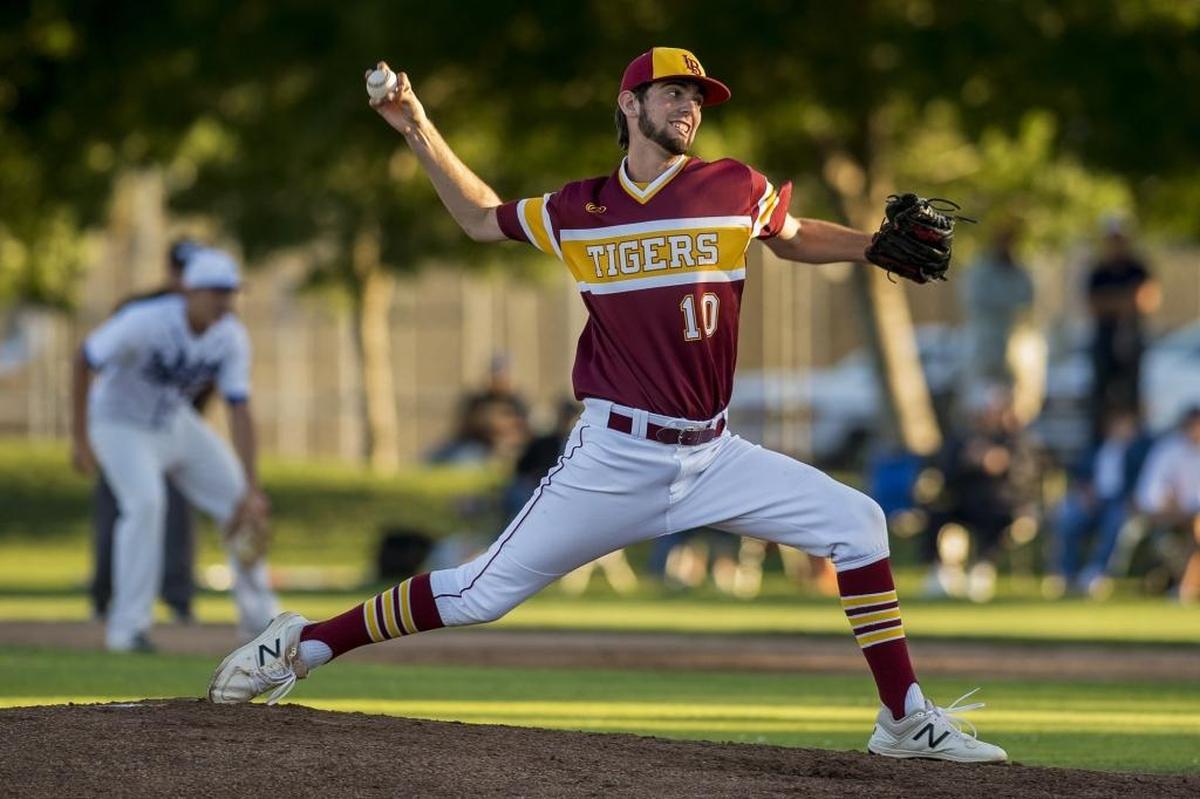 Los Banos' Kody Cardoza (10) pitches during the Merced County All-Star Game at Blue Devil Field in Merced, Calif., on Saturday, June 10, 2017.