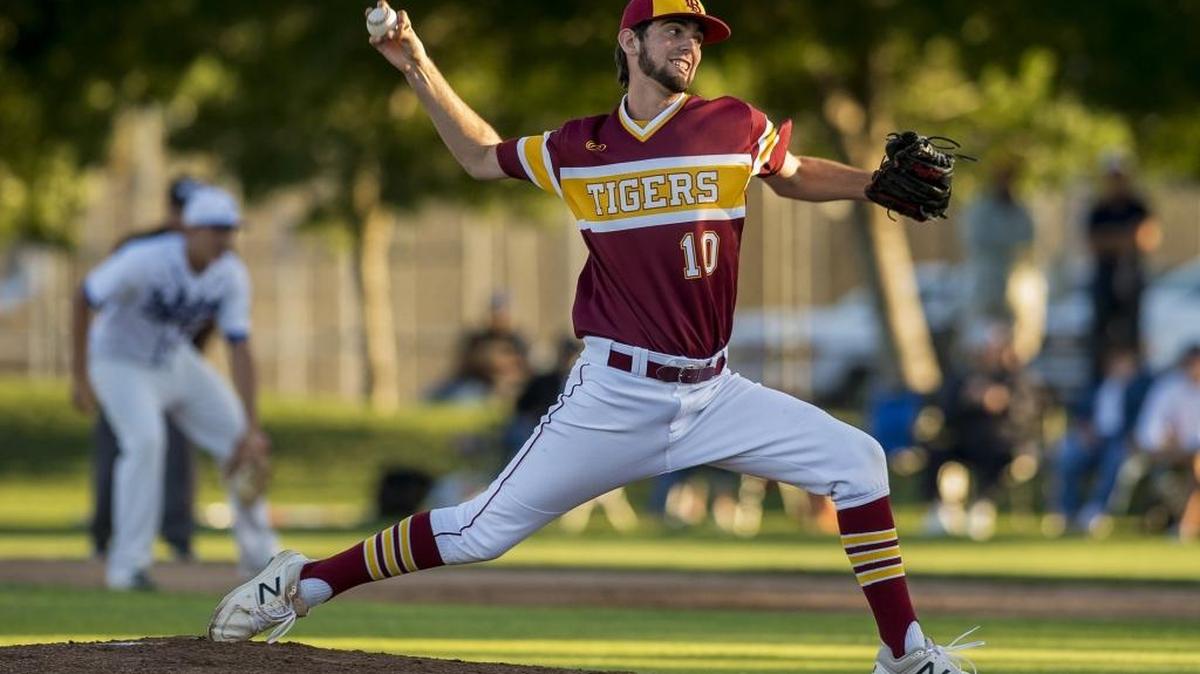 Los Banos' Kody Cardoza (10) pitches during the Merced County All-Star Game at Blue Devil Field in Merced, Calif., on Saturday, June 10, 2017.