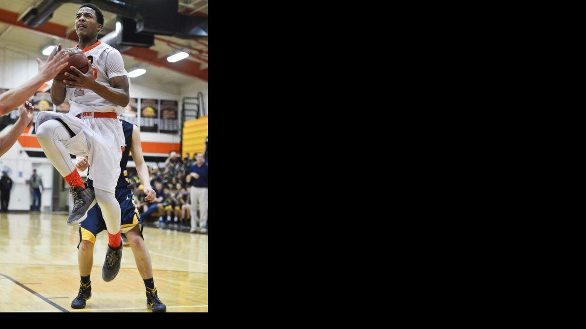 
Merced senior Brandon Blackwell (2) attempts a layup during a game against Turlock at Merced High School in Merced, Calif., Friday, Jan. 30, 2015. The Bulldogs beat the Bears 59-57.
