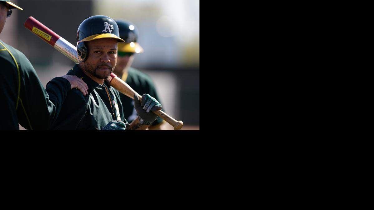  Coco Crisp, shown in the A’s Mesa, Ariz., camp last week, says he understands the reasoning behind his move to left field.